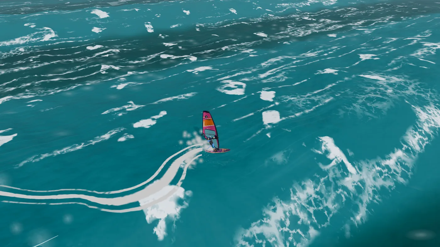 Vista de drone de um windsurfista diante de uma onda quebrando